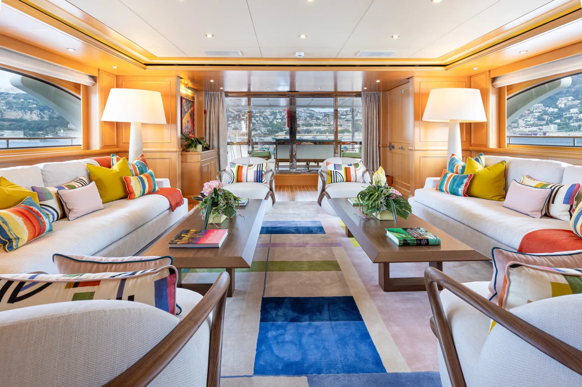 Main saloon with twin sofas and sea views
