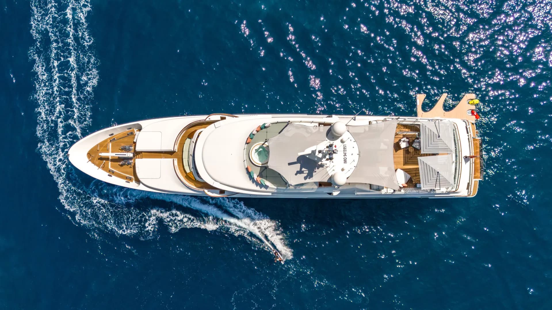 HANA seen from above, cruising clear blue Aegean water